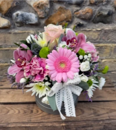 Perfect in Pink Hatbox - A stunning display of beautiful pink blooms presented beautifully in a stylish hatbox. Hand crafted and delivered to the door by you local florist Susettes flowers. 

Available for same day delivery on orders placed before 12 noon