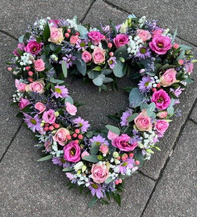 Pink Pastel Open Heart - A perfect collection of pretty pink pastel blooms arranged in an open heart design, lovingly crafted and delivered by the team at Susettes flowers.